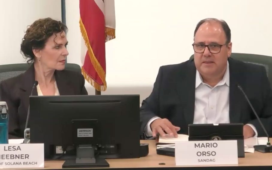 SANDAG Chairwoman Lesa Heebner, left, listens as CEO Mario Orso speaks about the ARJIS, a criminal justice database used by 65 agencies around the region. Courtesy image