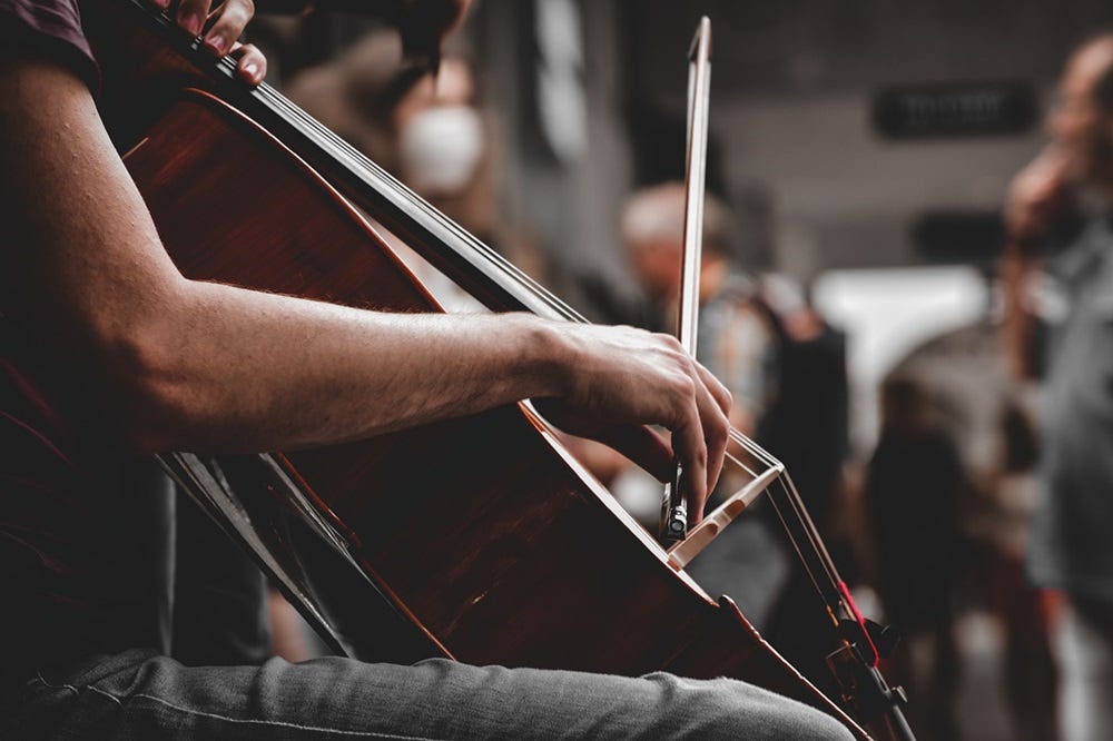 a woman plays a cello