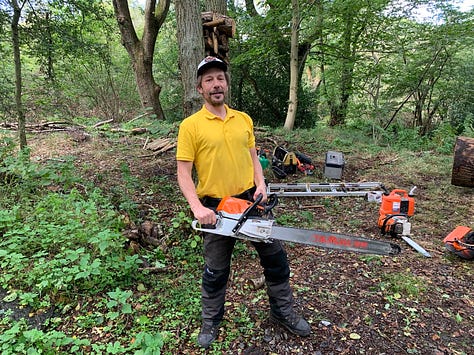 Me with a 16" bar suitable for small and medium trees on the left, the middle image is me with a 36" bar that is technically for large trees, but you'd probably use it on medium stuff in the real world because it is faster and easier and on the right is me with a 80" bar for when things get very big.