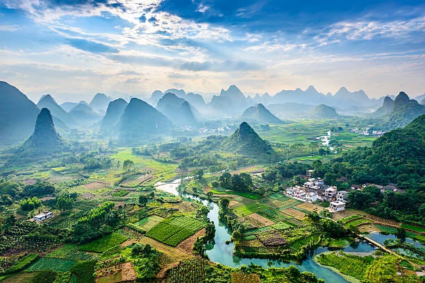 Landscape of Guilin Landscape of Guilin, Li River and Karst mountains. Located near Yangshuo County, Guilin City, Guangxi Province, China. china mountains stock pictures, royalty-free photos & images Landscape of Guilin Landscape of Guilin, Li River and Karst mountains. Located near Yangshuo County, Guilin City, Guangxi Province, China. china mountains stock pictures, royalty-free photos & images