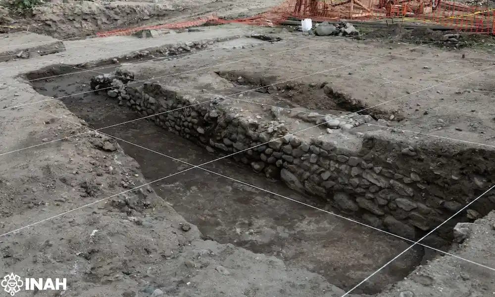 **Researchers from INAH uncovered a 40 by 80 meter structure featuring detached reliefs from Pyramid B, along with children’s burials and evidence of ritual sacrifice. Credit: Gerardo Peña, INAH** **Researchers from INAH uncovered a 40 by 80 meter structure featuring detached reliefs from Pyramid B, along with children’s burials and evidence of ritual sacrifice. Credit: Gerardo Peña, INAH**