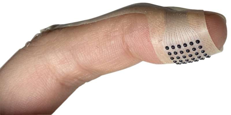 Bandage-like device brings texture to touchscreens