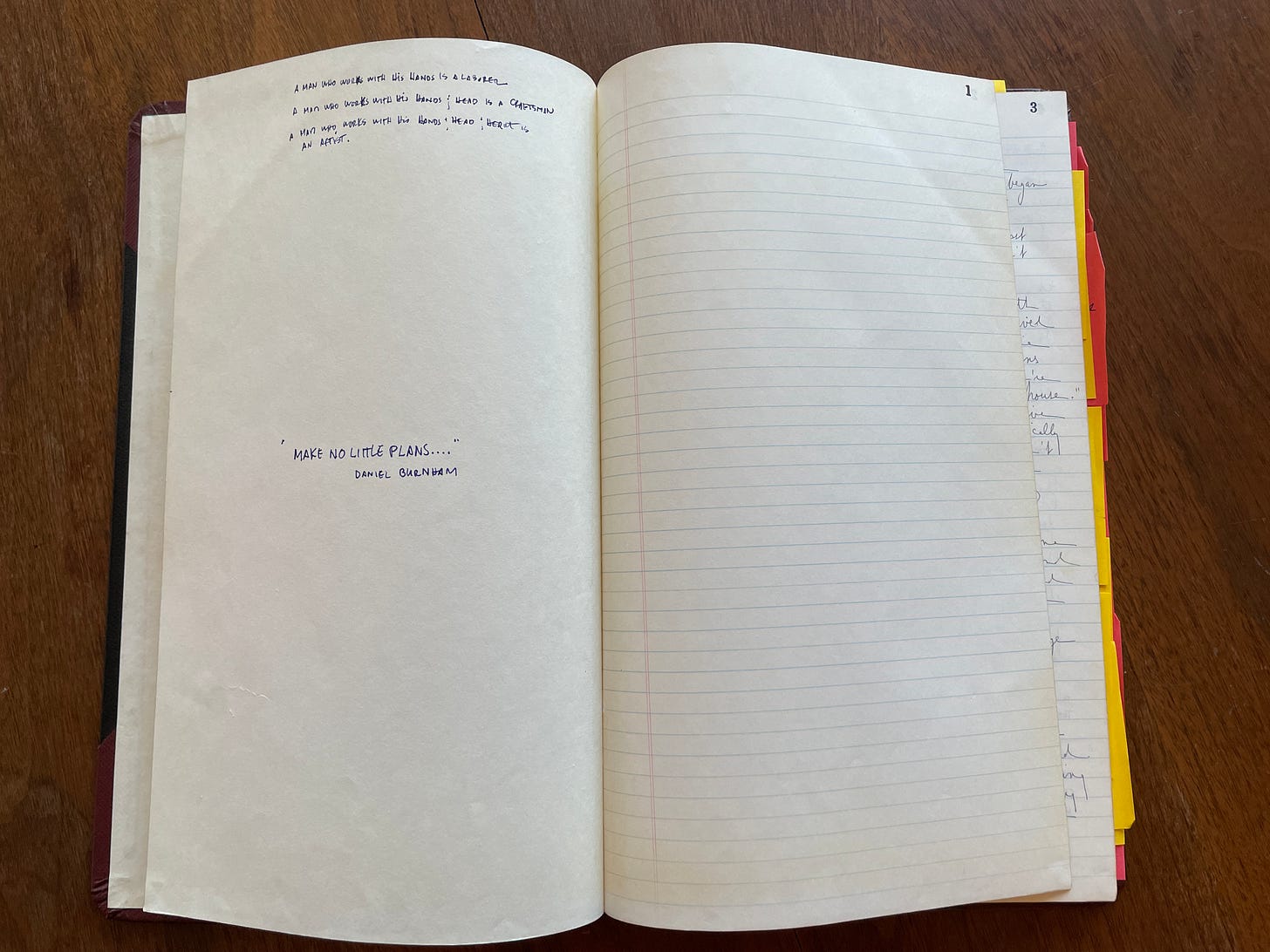 Open notebook with handwritten inscription on the left side. The right page is blank. Open notebook with handwritten inscription on the left side. The right page is blank.