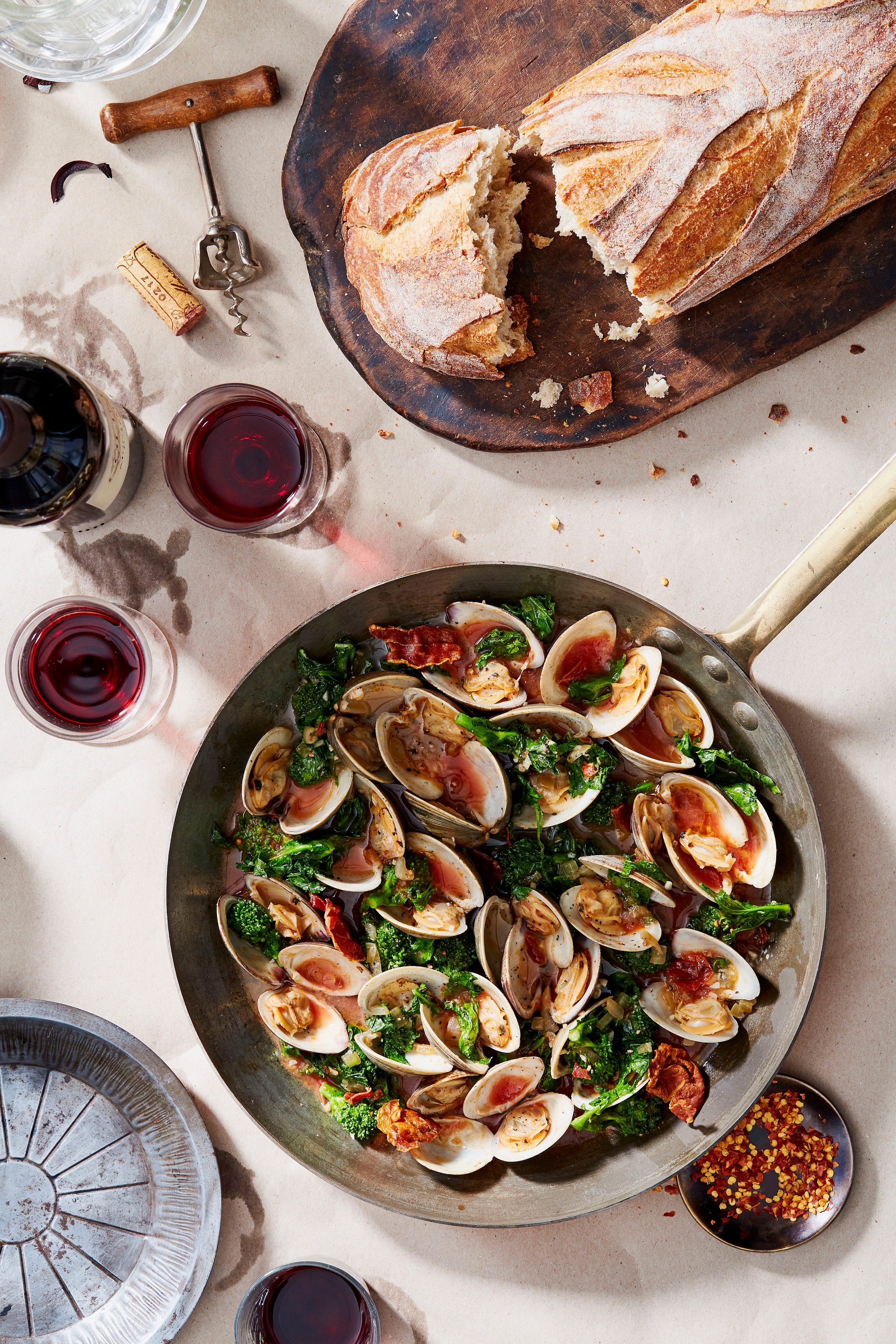 Clams with Broccoli Rabe and Crispy Prosciutto in Tomato-Wine Sauce