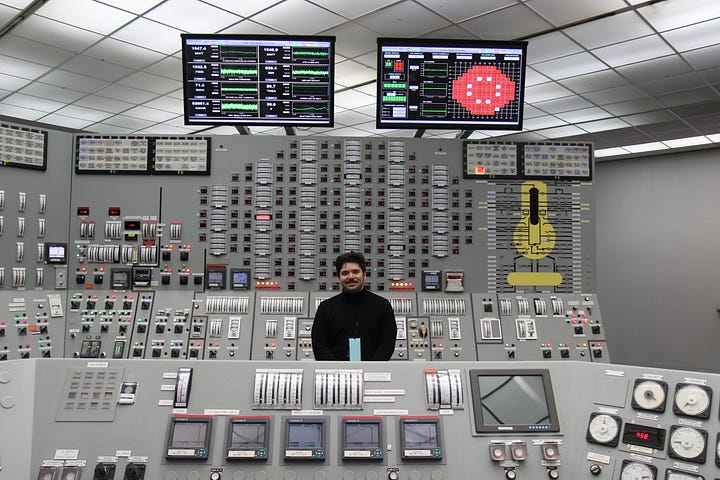 Clockwise from the top left: The area containing Nine Mile Point’s electrolyzer. Crews prepare the Unit 2 reactor of Nine Mile Point for refueling. The plant's steam tower. Your humble correspondent in the Unit 1 control room.