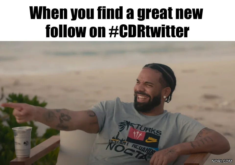 Text: "When you find a great new follow on #CDRtwitter." Below, Drake seated outdoors, laughing and pointing.