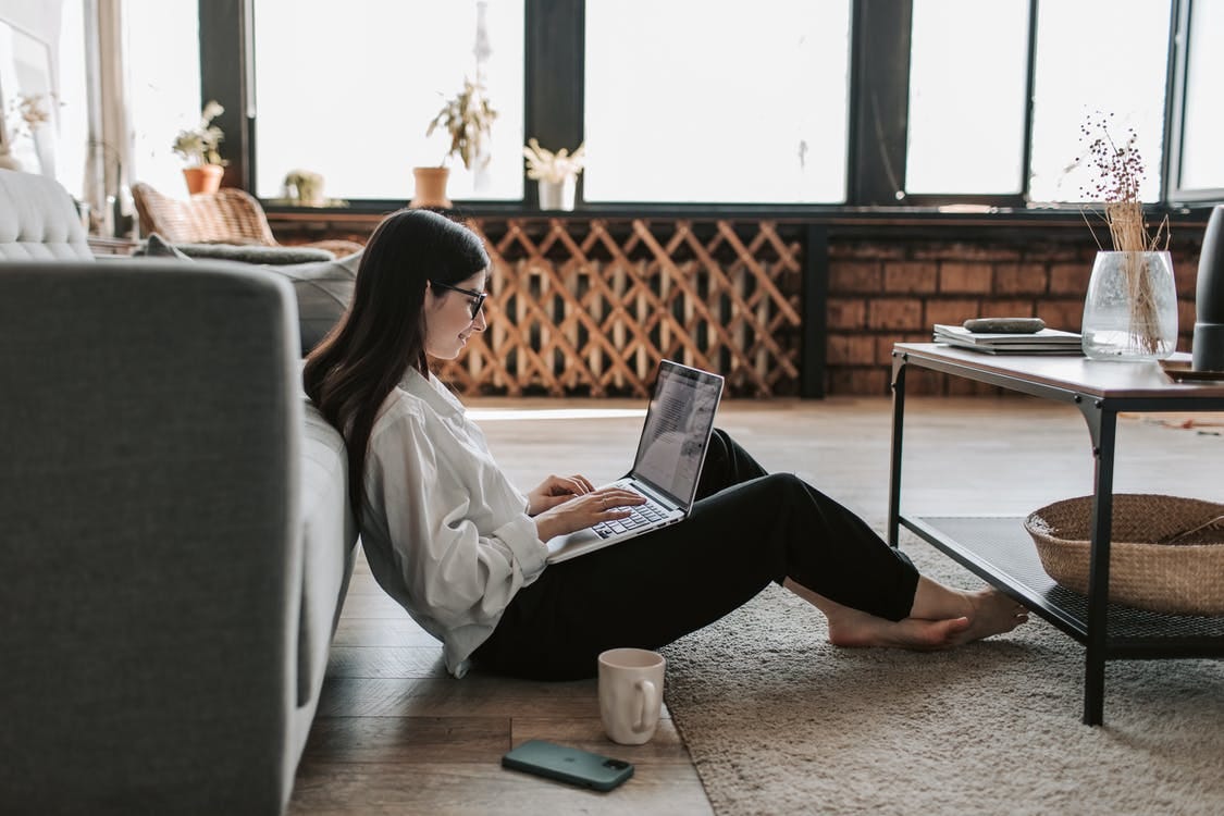 Woman Working At Home With Her Laptop Woman Working At Home With Her Laptop