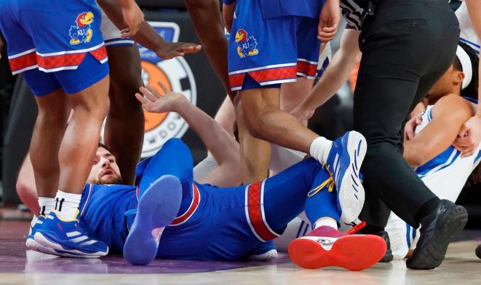 Kansas basketball's Hunter Dickinson ejected after kicking Duke's Maliq  Brown in the head