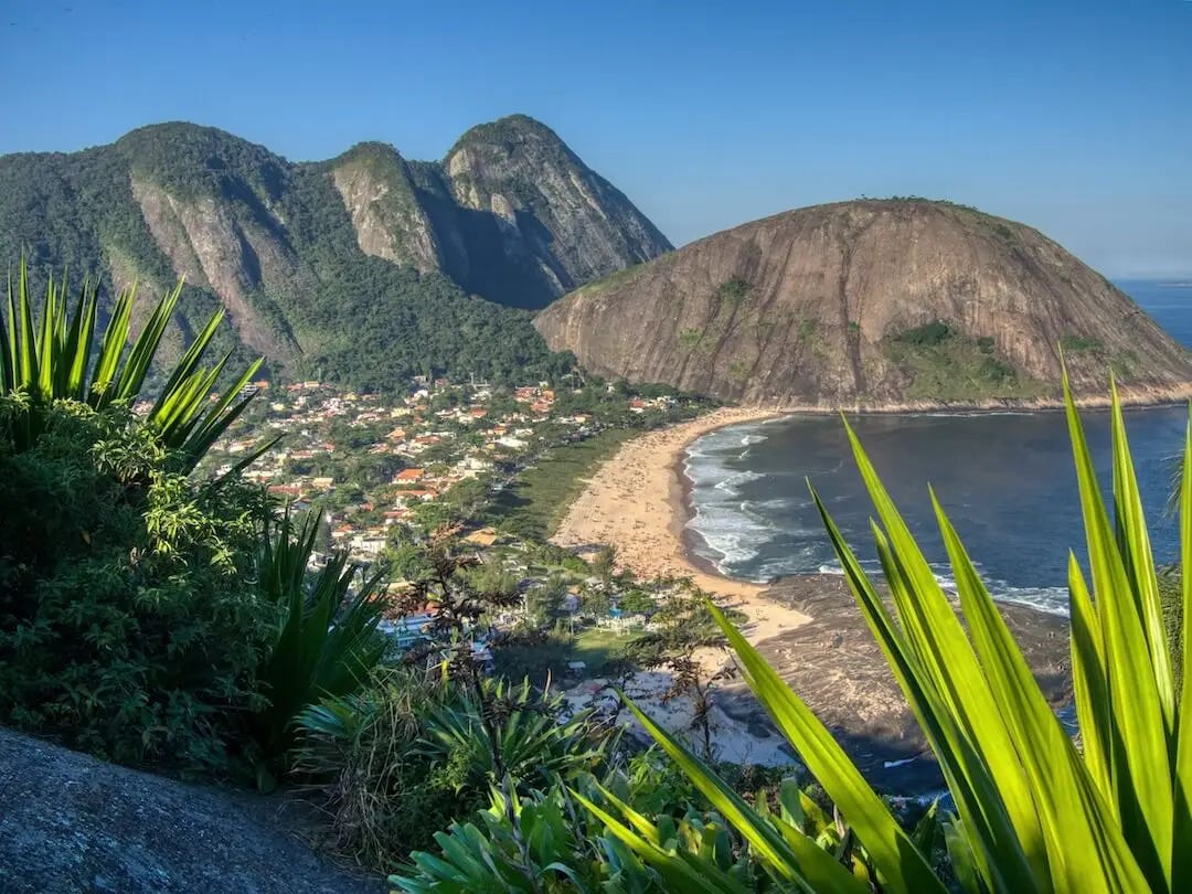  Aerial view of a beach surrounded by granite hillsides