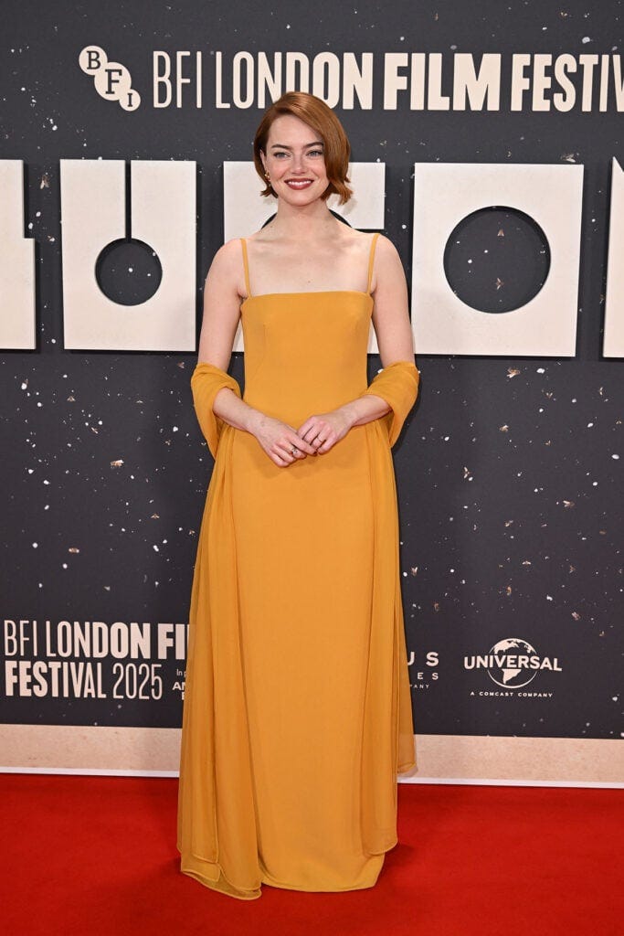 Emma Stone Glows in Mustard Louis Vuitton at 'Bugonia' Premiere