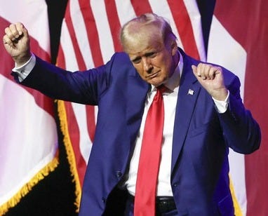 Former President Donald Trump dances as he leaves the stage after speaking at a fundraiser event for the Alabama GOP, Friday, Aug. 4, 2023, in Montgomery, Ala. (AP Photo/Butch Dill)