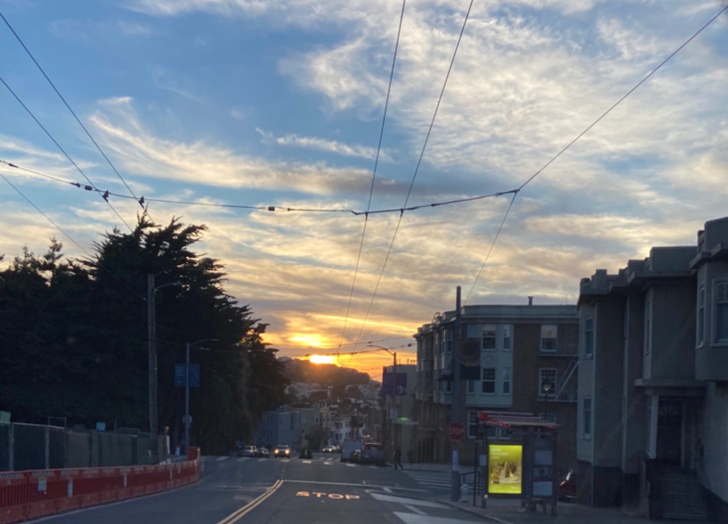 Sun setting in distance