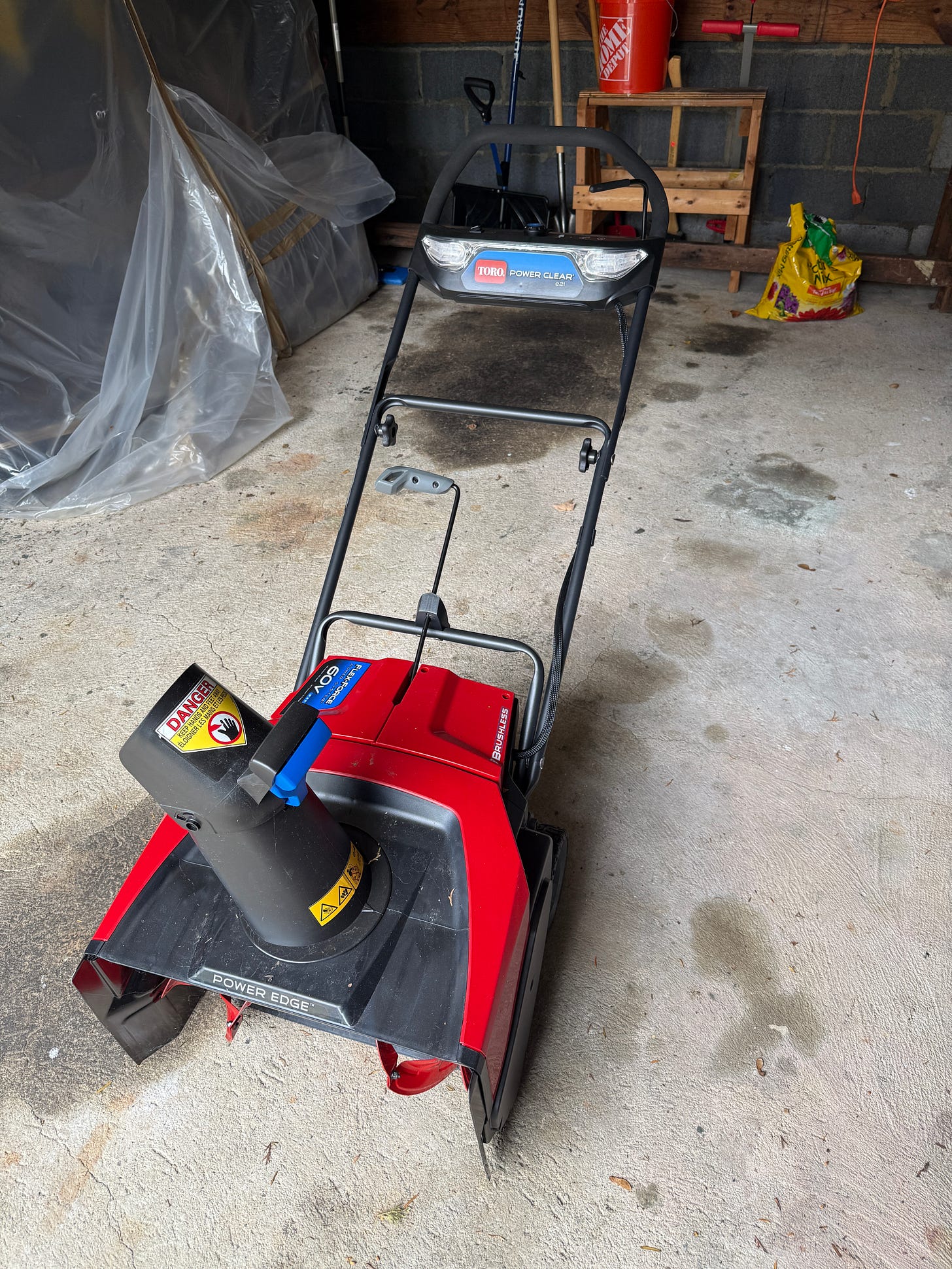 Chris' red toro snow blower in his garage Chris' red toro snow blower in his garage