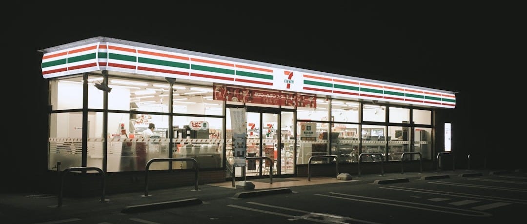 white and red concrete building during nighttime
