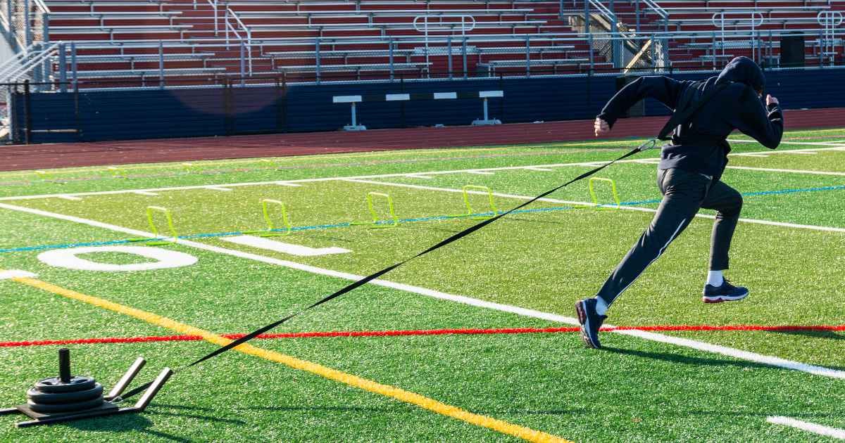 Athlete pulling a sled