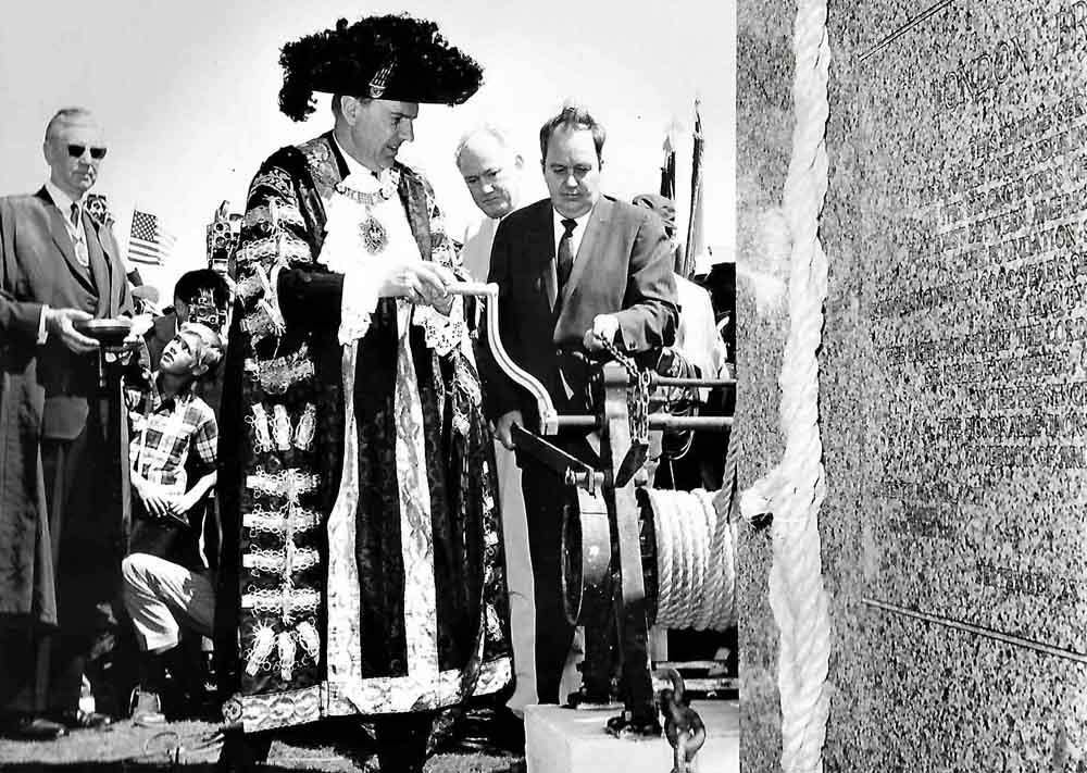 The cornerstone was lowered by Sir Gilbert Inglefield as McCulloch and Wood looked on