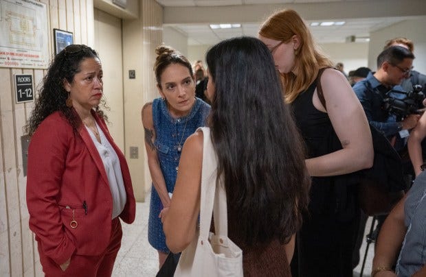 New York City Council member Alexa Aviles and New York State Senator Julia Salazar are pictured outside an immigration court in the Jacob K. Javits Building on Thursday. 