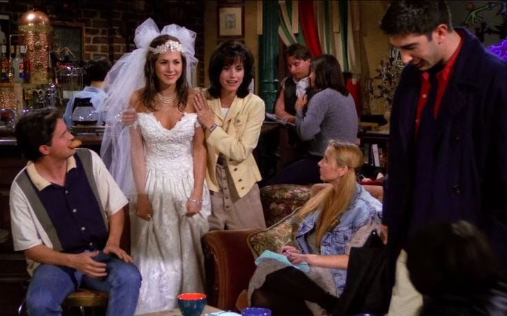 This may contain: the cast of friends are all dressed up for their wedding day in this scene from the tv show friends