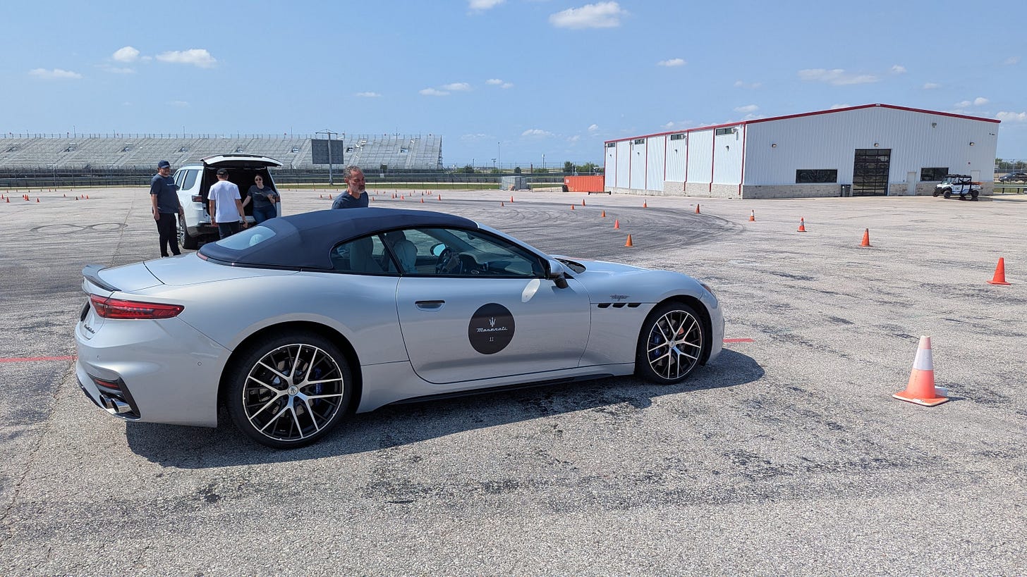 A silver Maserati GranCabrio lining up on an Autocross course
