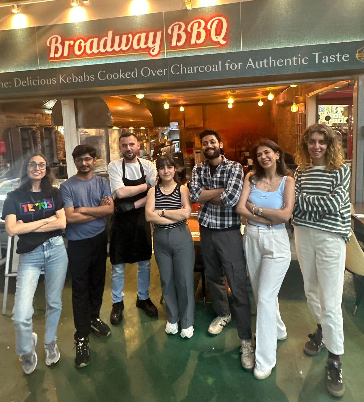 May be an image of 7 people and text that says "Broadway BroadwayBBQ BBQ Delicious Kebabs Cooked Over Charcoal for Authentic Taste"