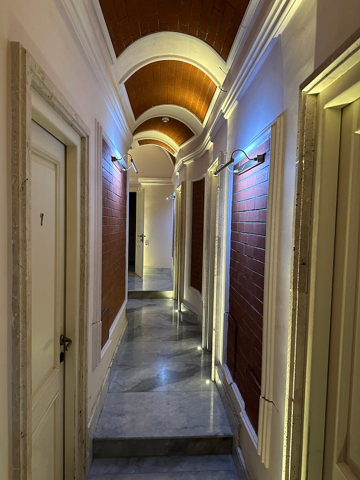 Hallway of a sulphur bath, and the author in front of the bath
