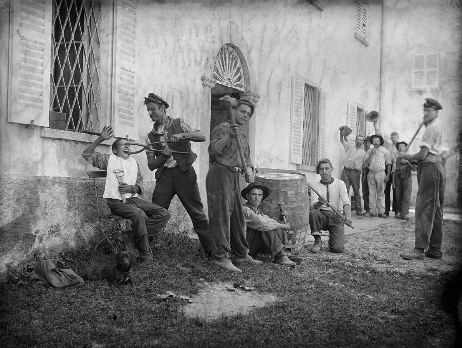 A charming scene from a Swiss village in Blenio Valley, part of Roberto Donetta's collection of 5,000 humorous glass negatives from the early 1900s.