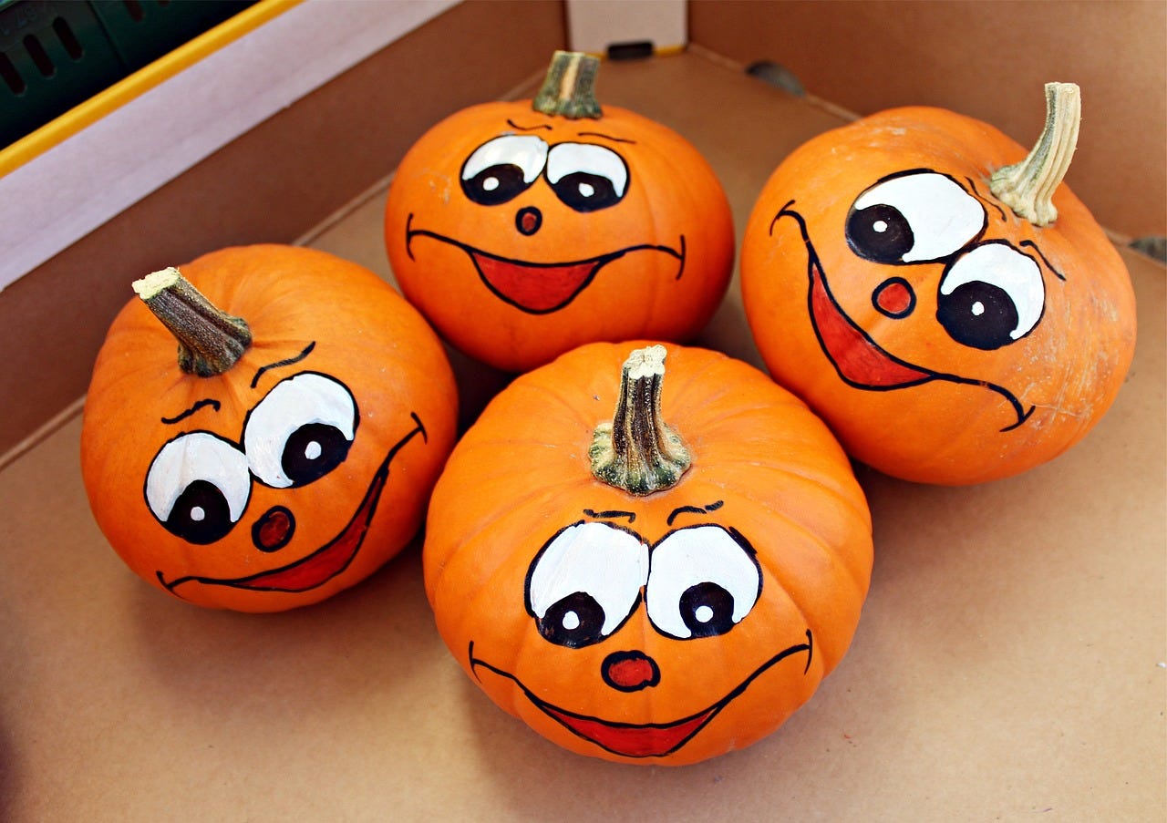 Painted designs on pumpkins Painted designs on pumpkins