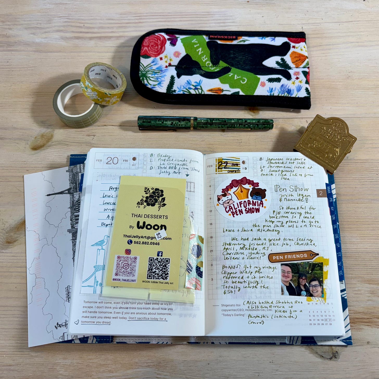 An image of Jho's journal with various journaling supplies