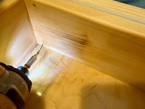 Montage of images showing custom cabinetry being built.