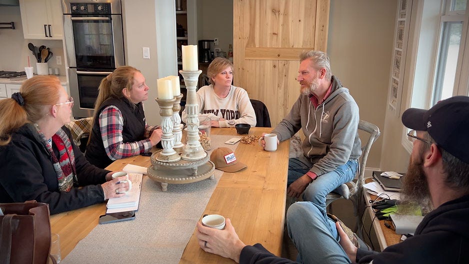 A photo of the small family meeting where they got together we raised our coffee mugs and celebrated the accomplishment of running a family cafe for all these years.