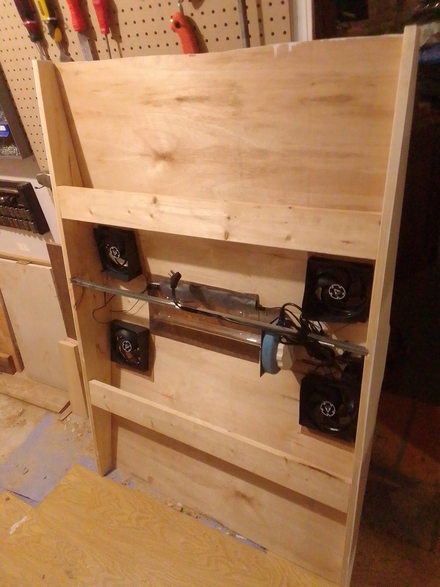 Interior of upper room UV box with all wiring, including channel for main power, UV light in place, and baffles cut down to minimum acceptable height