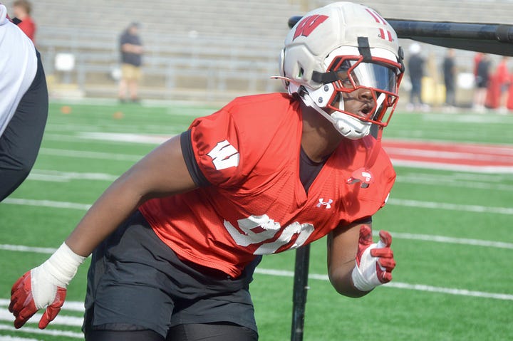 Wisconsin defensive linemen participate in individual position drills during Saturday's spring practice inside Camp Randall Stadium.