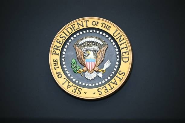 The seal of the President of the United States is displayed on a podium prior to remarks by US President Joe Biden, not pictured, in the Roosevelt...