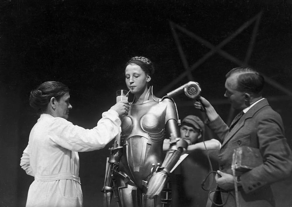 Brigitte Helm between takes on the set of Metropolis (1927).