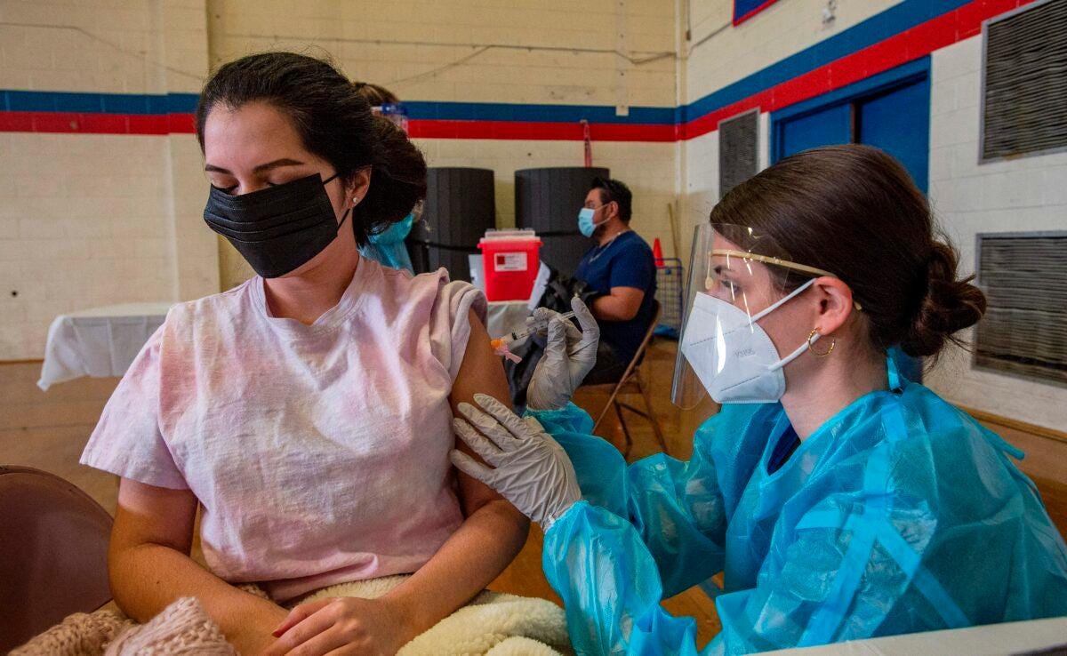 A COVID-19 vaccination hub at Central Falls High School in Central Falls, R.I., on Feb. 13, 2021. (Joseph Prezioso/AFP via Getty Images) A COVID-19 vaccination hub at Central Falls High School in Central Falls, R.I., on Feb. 13, 2021. (Joseph Prezioso/AFP via Getty Images)