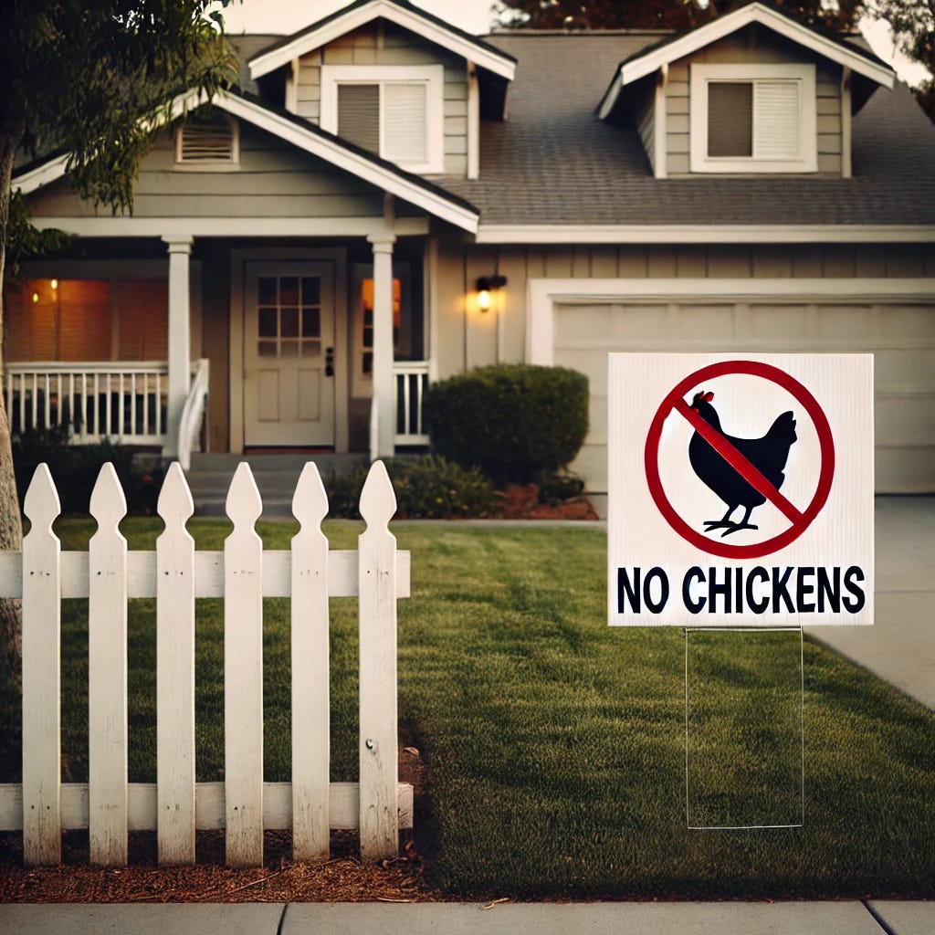 A suburban house with a neatly maintained front yard and a visible sign in the yard reading 'No Chickens' with a crossed-out chicken symbol. The house is a modest single-story home with a porch, surrounded by a white picket fence. The atmosphere is calm and residential, emphasizing the sign's message in the foreground.