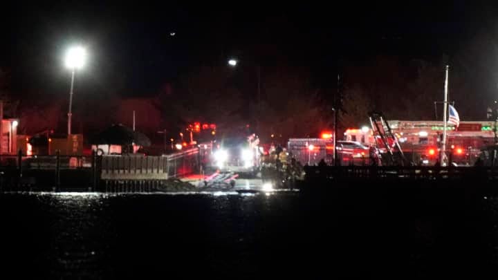 A view of emergency response looking from Arlington, Va., south of Ronald Reagan Washington National Airport, across the Potomac River toward the District of Columbia, Wednesday, Jan. 29, 2025.