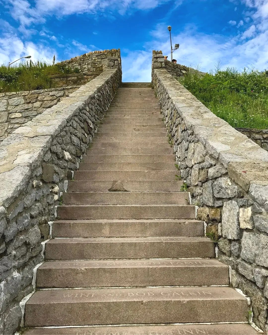 forty steps, grass, sky forty steps, grass, sky