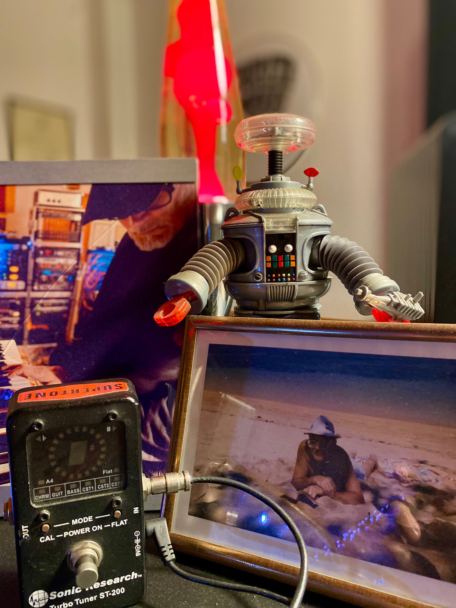 Image of father, son and robot in the Supertone Studio