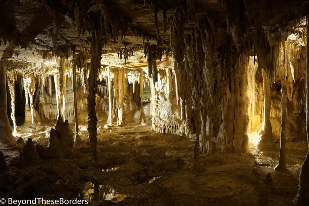 Inside Lehman Caves.  Stalactites touching stalagmites connecting the ceiling to the ground.