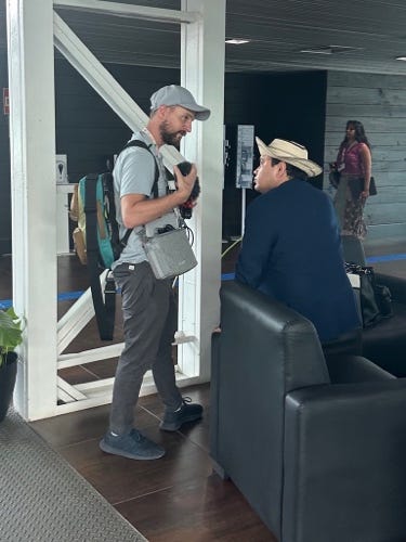 A person standing in front of a couch

AI-generated content may be incorrect.