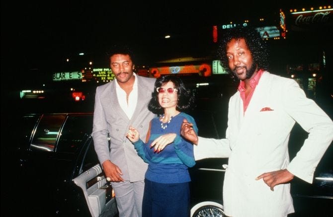 Two pimps on patrol. Some men labelled as pimps actually stayed home and took care of the children. (photo: A. Sprinkle)