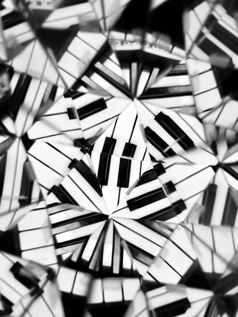 Photos of toys and instruments through a kaleidoscope