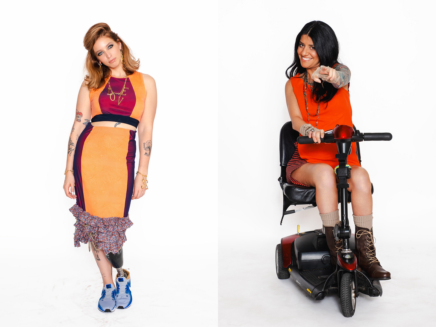 Two vibrant fashion portraits against a white background. The model on the left, who has a prosthetic leg, wears a color-blocked orange and purple dress. The model on the right, seated on a mobility scooter, wears a bright orange top and points engagingly at the camera.