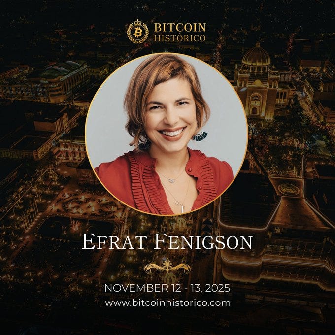 A circular portrait of Efrat Fenigson, a woman with shoulder-length brown hair, wearing a red ruffled blouse and a necklace. The background features a nighttime cityscape of San Salvador with illuminated buildings. Text overlays include "BITCOIN HISTÓRICO" with a Bitcoin logo, "Efrat Fenigson," and event details "NOVEMBER 12 - 13, 2025" along with a website URL. A circular portrait of Efrat Fenigson, a woman with shoulder-length brown hair, wearing a red ruffled blouse and a necklace. The background features a nighttime cityscape of San Salvador with illuminated buildings. Text overlays include "BITCOIN HISTÓRICO" with a Bitcoin logo, "Efrat Fenigson," and event details "NOVEMBER 12 - 13, 2025" along with a website URL.