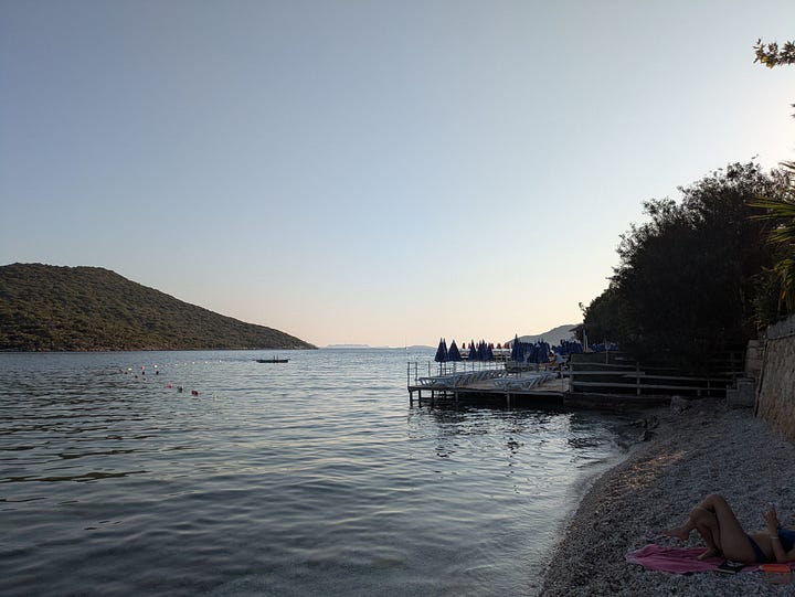 Ancient theater and evening dip in the Mediterranean