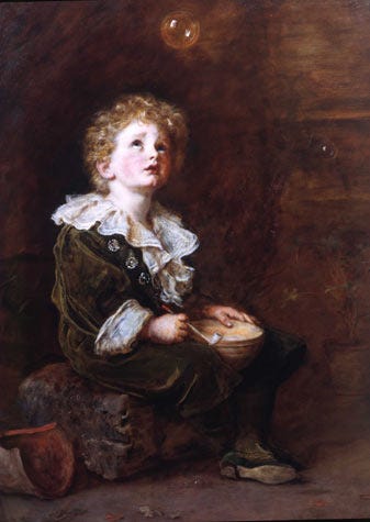 A golden haired boy in green gazes up at a soap bubble he has just blown A golden haired boy in green gazes up at a soap bubble he has just blown