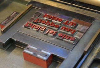 Layout grid in metal movable type