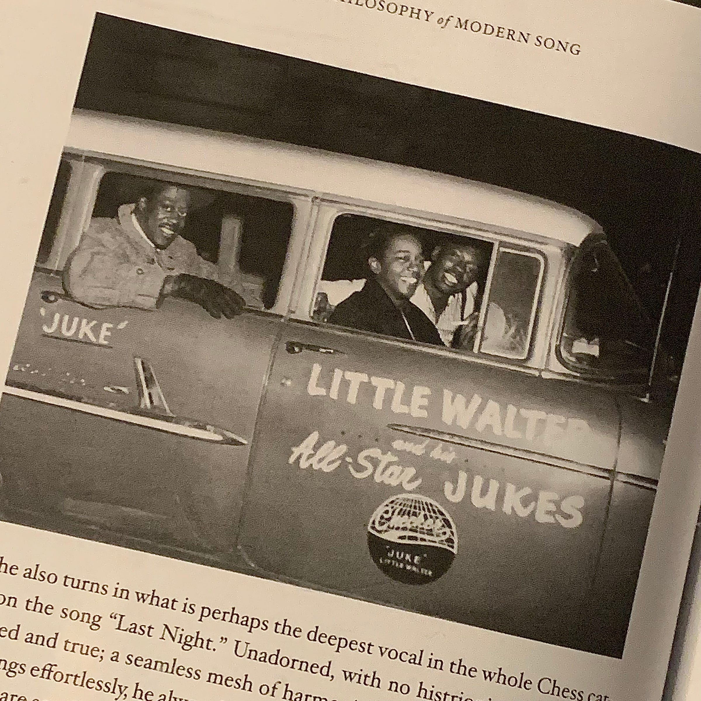 Little Walter and two of his band members in a car labeled all star jukes
