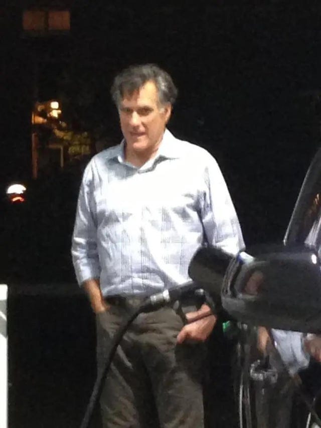 r/Presidents - a person standing next to a car